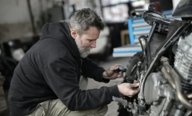 Man repairing a motorcycle