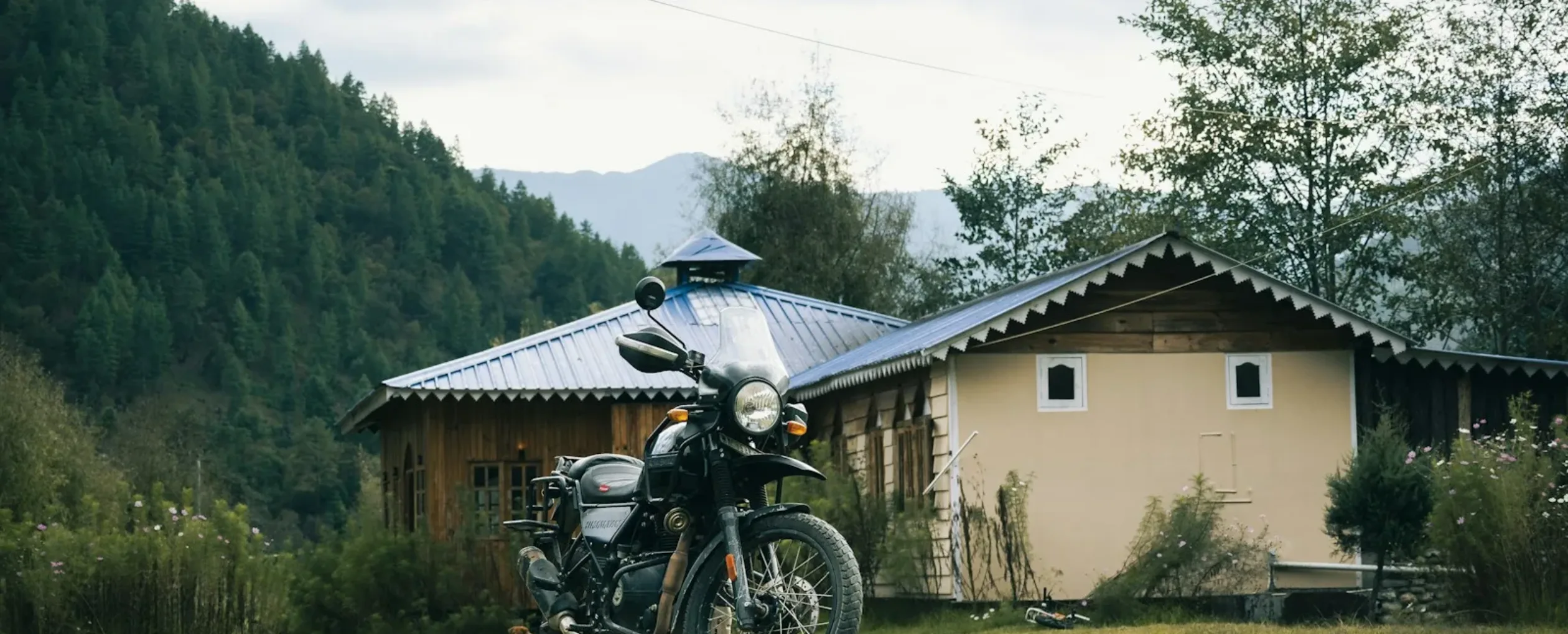 A motorcycle parked in front of a house